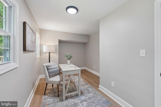 3521 Forestdale Ave, Woodbridge, VA 22193 - home office featuring wood finished floors and baseboards