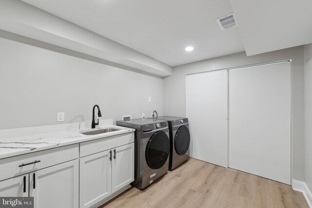 3521 Forestdale Ave, Woodbridge, VA 22193 - laundry room featuring washer and clothes dryer, light wood-style floors, cabinet space, and recessed lighting