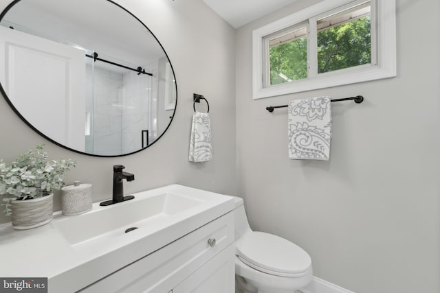3521 Forestdale Ave, Woodbridge, VA 22193 - bathroom featuring a stall shower, toilet, vanity, and baseboards