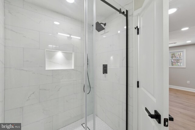 3521 Forestdale Ave, Woodbridge, VA 22193 - bathroom with a shower stall, baseboards, recessed lighting, and wood finished floors