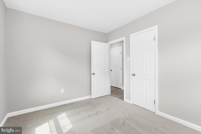 200 S Longcross Rd, Linthicum Heights, MD 21090 - unfurnished bedroom featuring carpet and baseboards
