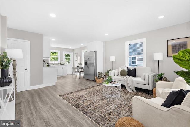 200 S Longcross Rd, Linthicum Heights, MD 21090 - living area featuring light wood-style flooring, recessed lighting, and baseboards