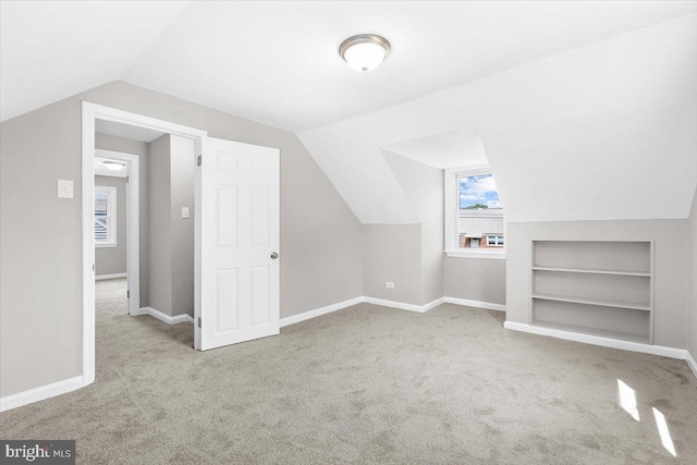 200 S Longcross Rd, Linthicum Heights, MD 21090 - additional living space featuring carpet floors, lofted ceiling, built in features, and baseboards