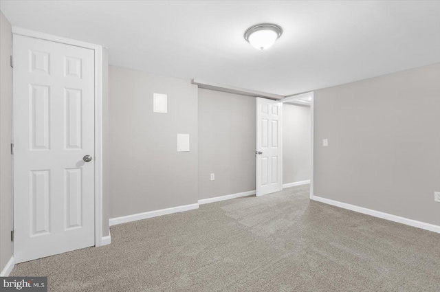 200 S Longcross Rd, Linthicum Heights, MD 21090 - spare room featuring carpet flooring and baseboards