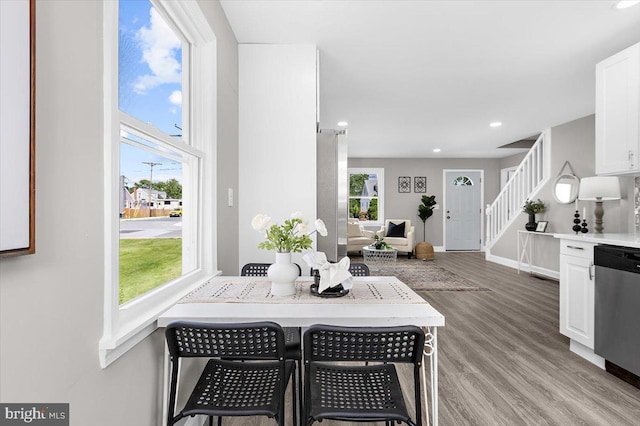 200 S Longcross Rd, Linthicum Heights, MD 21090 - dining space featuring light wood-type flooring, recessed lighting, baseboards, and stairway