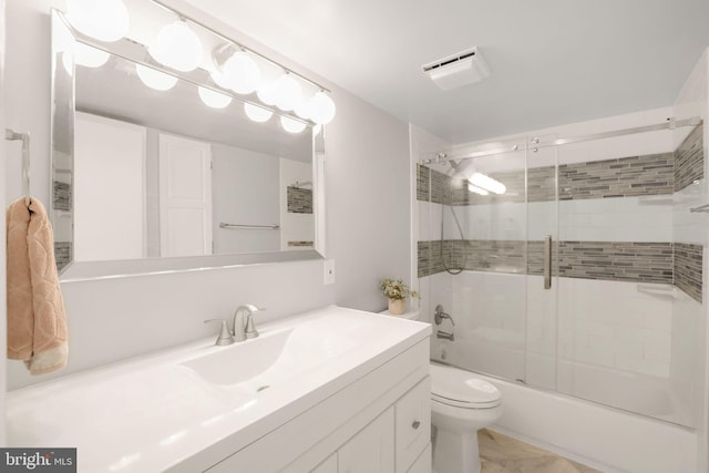 5041 7th Rd S Unit 102, Arlington, VA 22204 - full bathroom featuring vanity, bath / shower combo with glass door, toilet, and marble look tile flooring