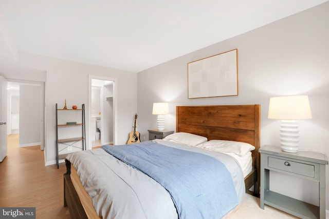 5041 7th Rd S Unit 102, Arlington, VA 22204 - bedroom featuring light wood-style floors and baseboards