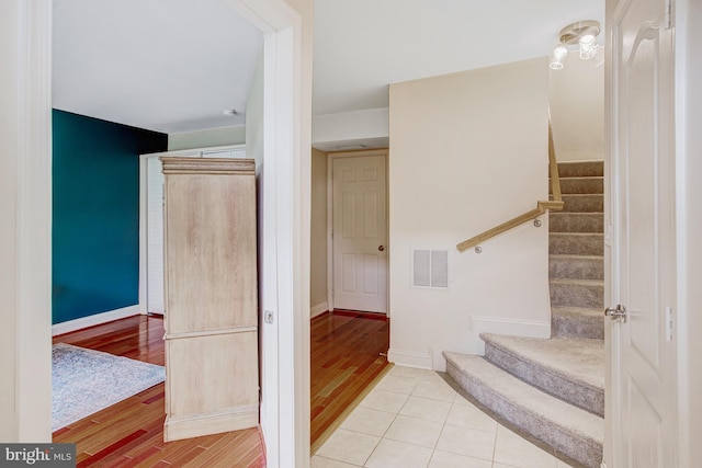 2505 Basin View Ln, Woodbridge, VA 22191 - stairs with baseboards and wood finished floors
