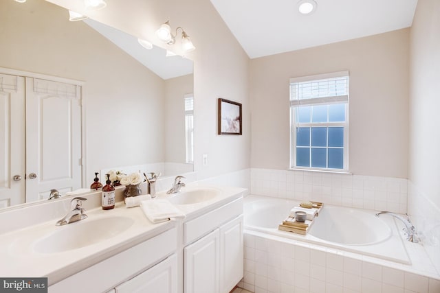 2505 Basin View Ln, Woodbridge, VA 22191 - full bath featuring double vanity, a bath, and vaulted ceiling