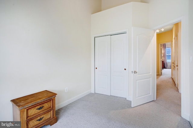 2505 Basin View Ln, Woodbridge, VA 22191 - unfurnished bedroom with light colored carpet, a closet, and baseboards