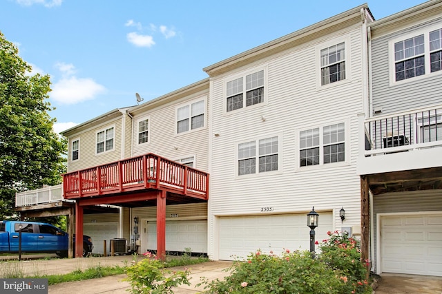 2505 Basin View Ln, Woodbridge, VA 22191 - back of house featuring central AC unit and an attached garage