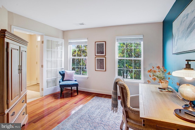 2505 Basin View Ln, Woodbridge, VA 22191 - office with healthy amount of natural light, light wood-type flooring, and baseboards