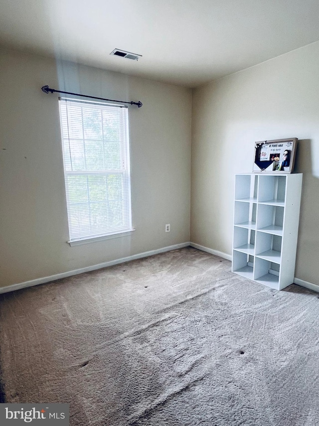 7884 Seafarer Way, Lorton, VA 22079 - carpeted empty room with baseboards