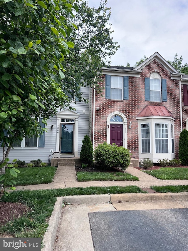 7884 Seafarer Way, Lorton, VA 22079 - townhome / multi-family property featuring brick siding