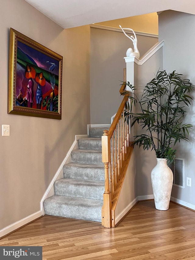 7884 Seafarer Way, Lorton, VA 22079 - staircase featuring wood finished floors and baseboards