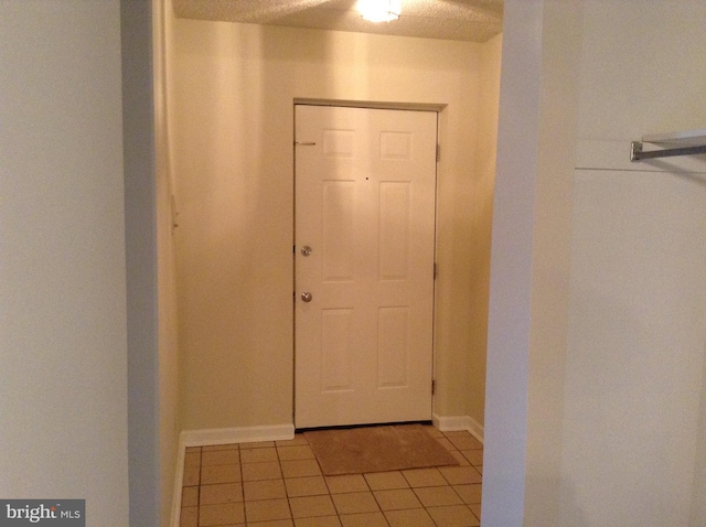 406 Deer Run, Norristown, PA 19403 - hallway with light tile patterned floors and baseboards