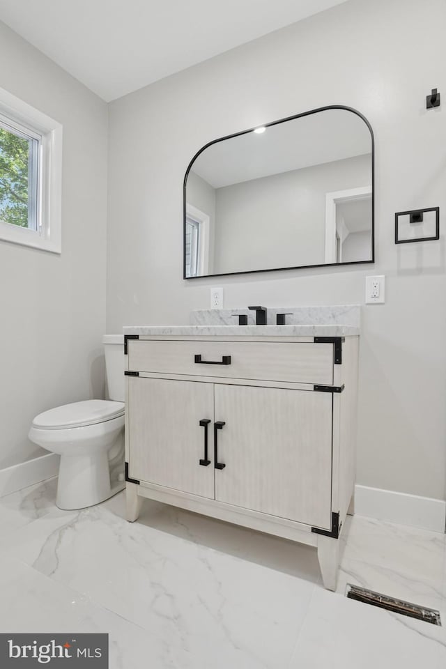 37 Anglin Dr, Newark, DE 19713 - bathroom featuring marble finish flooring, baseboards, vanity, and toilet