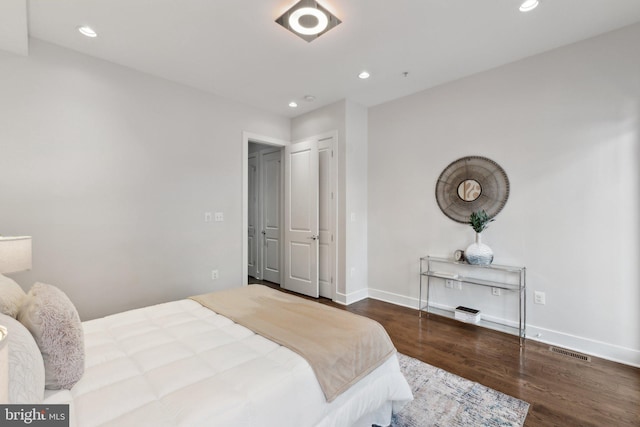 652 L St NE Unit 1, Washington, DC 20002 - bedroom featuring wood finished floors, recessed lighting, and baseboards