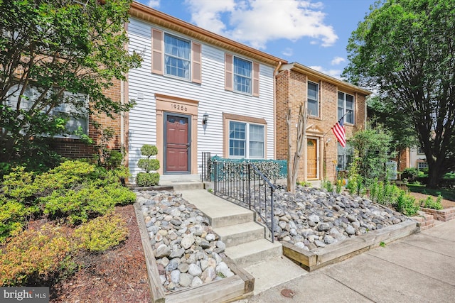 19256 Misty Meadow Ter, Germantown, MD 20874 - townhome / multi-family property with brick siding