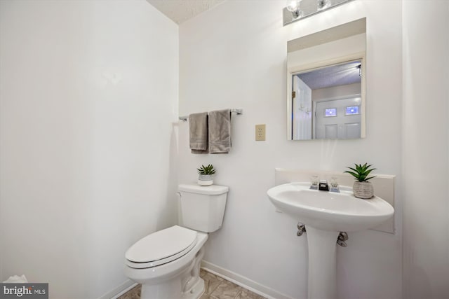 19256 Misty Meadow Ter, Germantown, MD 20874 - bathroom featuring baseboards and toilet