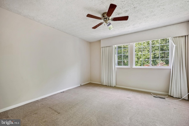 19256 Misty Meadow Ter, Germantown, MD 20874 - spare room with carpet, a textured ceiling, baseboards, and a ceiling fan