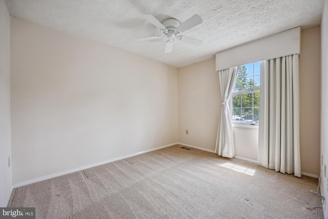 19256 Misty Meadow Ter, Germantown, MD 20874 - spare room with carpet, a ceiling fan, baseboards, and a textured ceiling