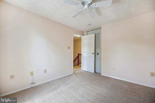 19256 Misty Meadow Ter, Germantown, MD 20874 - carpeted empty room featuring a ceiling fan, baseboards, and a textured ceiling