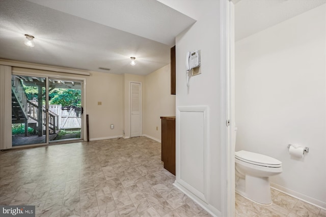 19256 Misty Meadow Ter, Germantown, MD 20874 - spare room with baseboards and a wall mounted AC