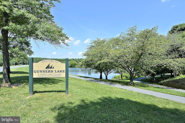 19256 Misty Meadow Ter, Germantown, MD 20874 - community sign with a lawn and a water view
