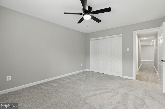 2310 Ewing Ave Unit 203, Suitland, MD 20746 - unfurnished bedroom featuring carpet flooring, a closet, and ceiling fan