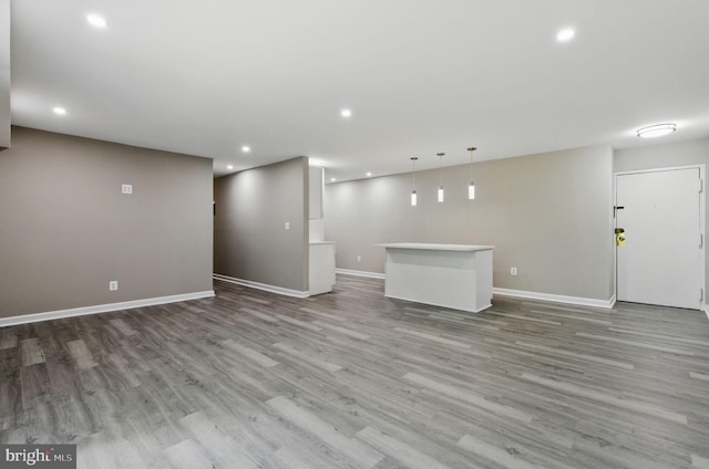 2310 Ewing Ave Unit 203, Suitland, MD 20746 - unfurnished living room with wood finished floors and recessed lighting