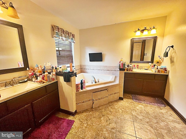 169 Fieldbrook Dr, Magnolia, DE 19962 - bathroom with two vanities and a garden tub