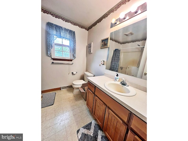 169 Fieldbrook Dr, Magnolia, DE 19962 - full bath with a shower, toilet, baseboards, vanity, and ornamental molding