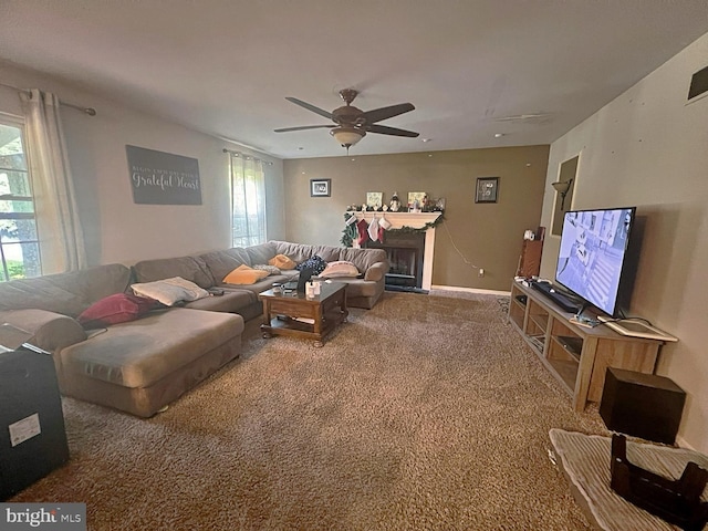 169 Fieldbrook Dr, Magnolia, DE 19962 - living area with healthy amount of natural light, carpet flooring, ceiling fan, and a fireplace