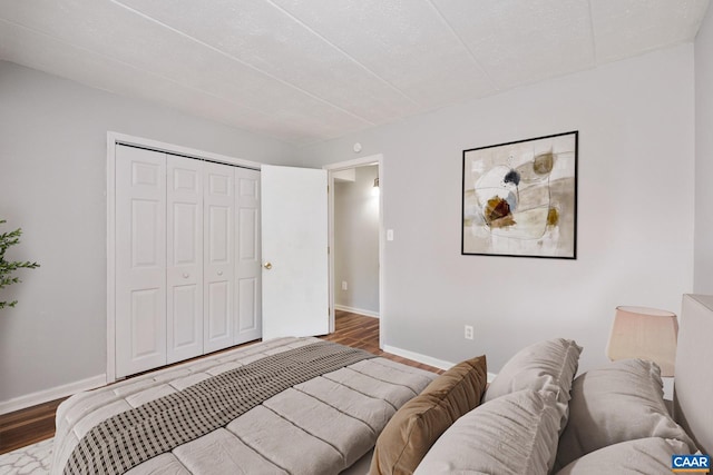 30 Spring Ct, Charlottesville, VA 22901 - bedroom featuring baseboards, a closet, and wood finished floors