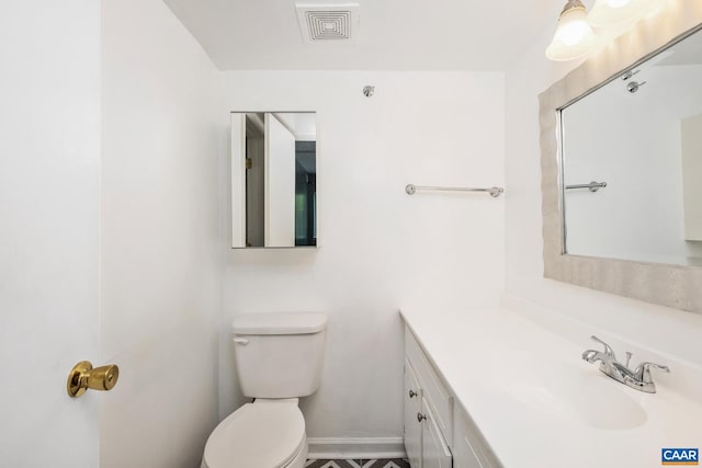 30 Spring Ct, Charlottesville, VA 22901 - bathroom featuring toilet, vanity, and baseboards