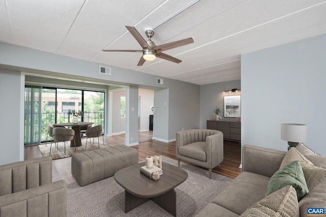 30 Spring Ct, Charlottesville, VA 22901 - living room featuring ceiling fan, wood finished floors, baseboards, and a textured ceiling