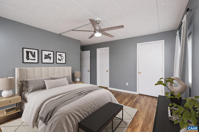 30 Spring Ct, Charlottesville, VA 22901 - bedroom with wood finished floors, baseboards, and ceiling fan