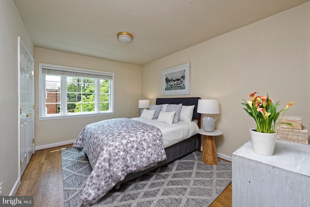 417 Gibbon St, Alexandria, VA 22314 - bedroom with baseboards and wood finished floors