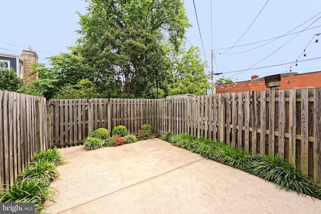 417 Gibbon St, Alexandria, VA 22314 - fenced backyard featuring a patio area