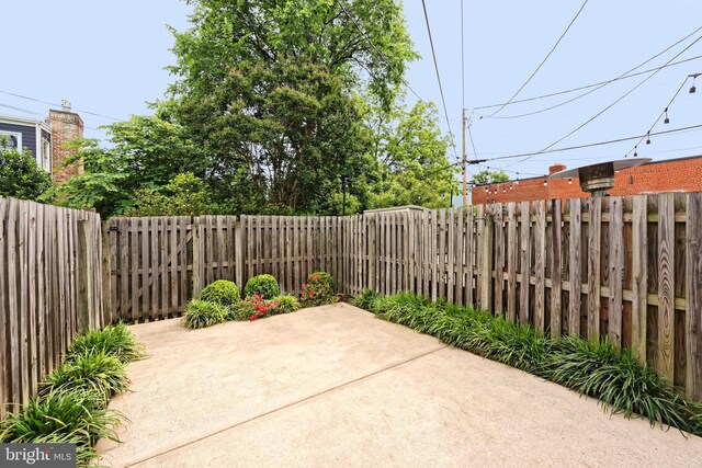 417 Gibbon St, Alexandria, VA 22314 - fenced backyard featuring a patio area