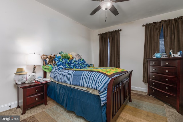 1145 Dargon Quarry Ln, Brunswick, MD 21716 - carpeted bedroom featuring baseboards and a ceiling fan