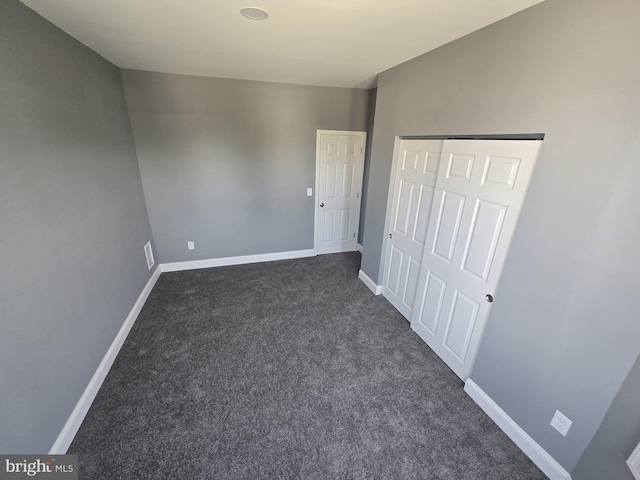 1361 Park Blvd, Camden, NJ 08103 - unfurnished bedroom with dark colored carpet and a closet