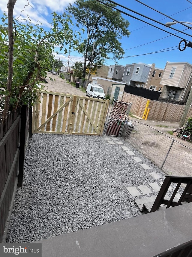 1361 Park Blvd, Camden, NJ 08103 - view of yard featuring a gate and a residential view