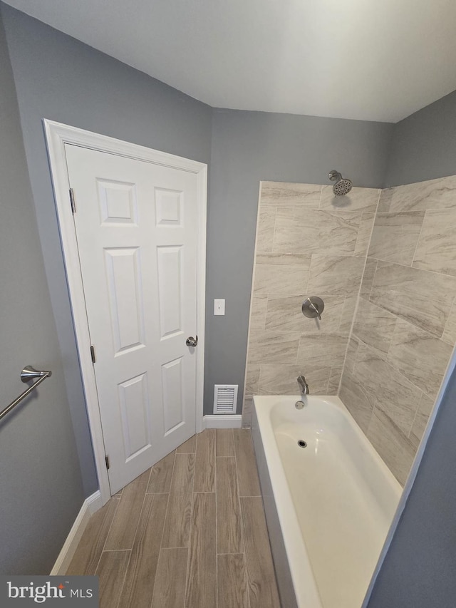 1361 Park Blvd, Camden, NJ 08103 - full bathroom featuring wood tiled floors and tub / shower combination