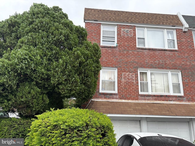 250 Nandina Plz, Philadelphia, PA 19116 - view of side of property featuring brick siding and roof with shingles