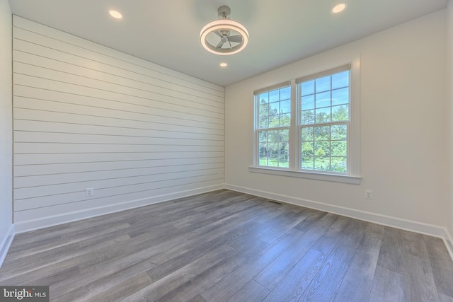 15634 Calum Ct, Haymarket, VA 20169 - unfurnished room with baseboards, dark wood-style floors, and recessed lighting
