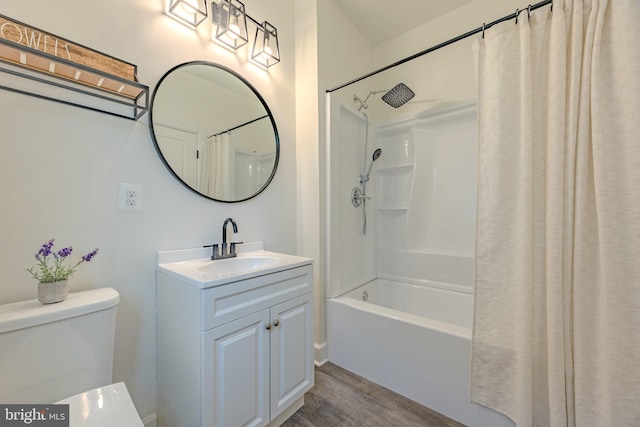 15634 Calum Ct, Haymarket, VA 20169 - bathroom featuring vanity, shower / bathtub combination with curtain, toilet, and wood finished floors