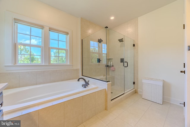 15634 Calum Ct, Haymarket, VA 20169 - full bath with tile patterned flooring, a garden tub, a stall shower, recessed lighting, and vanity