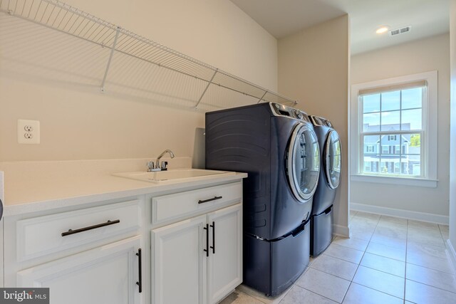 15634 Calum Ct, Haymarket, VA 20169 - laundry room featuring washer and clothes dryer, baseboards, light tile patterned floors, cabinet space, and recessed lighting